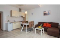 Apartmani Ujaković Apartman 2 – A5+1 foto 1